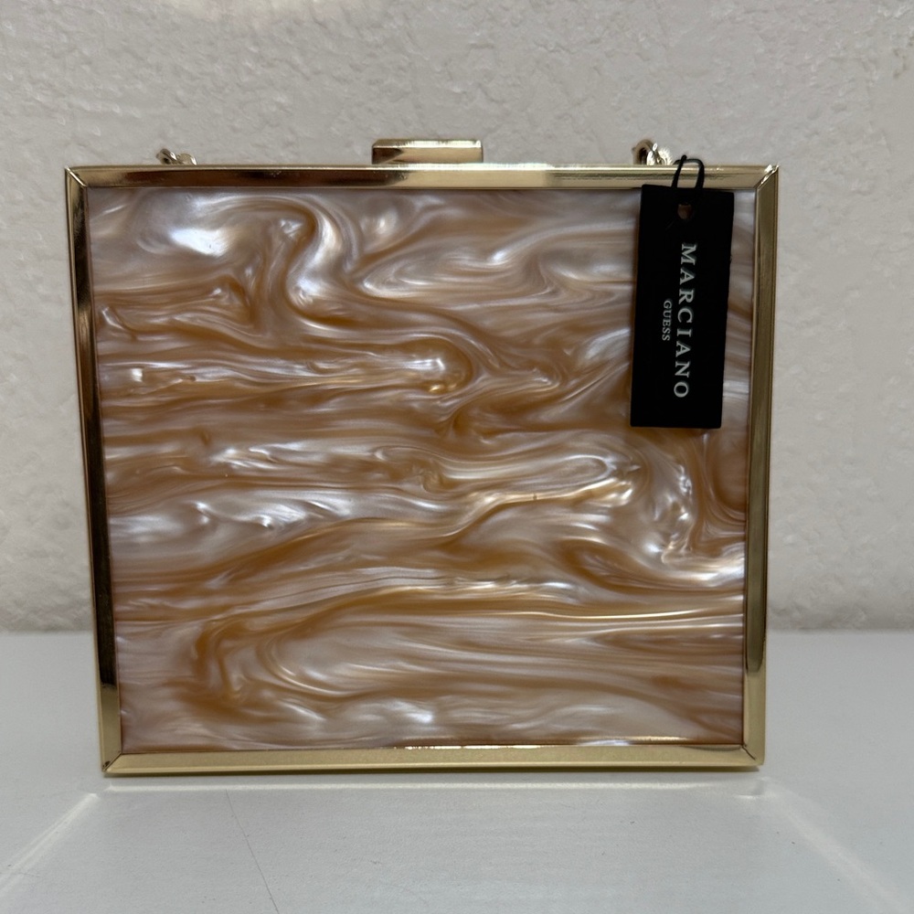 Marciano Gold and Cream Swirl Clutch